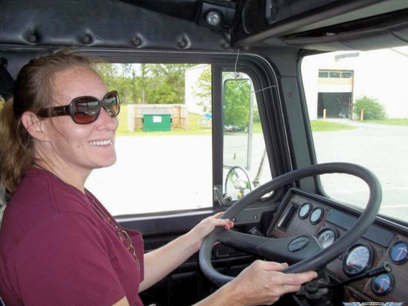 woman driving truck
